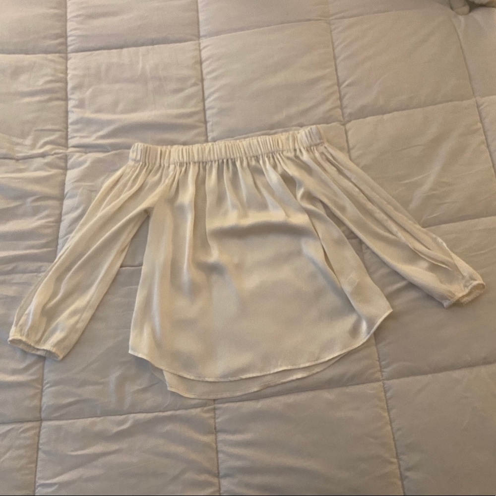 Off-white silky off the shoulder blouse